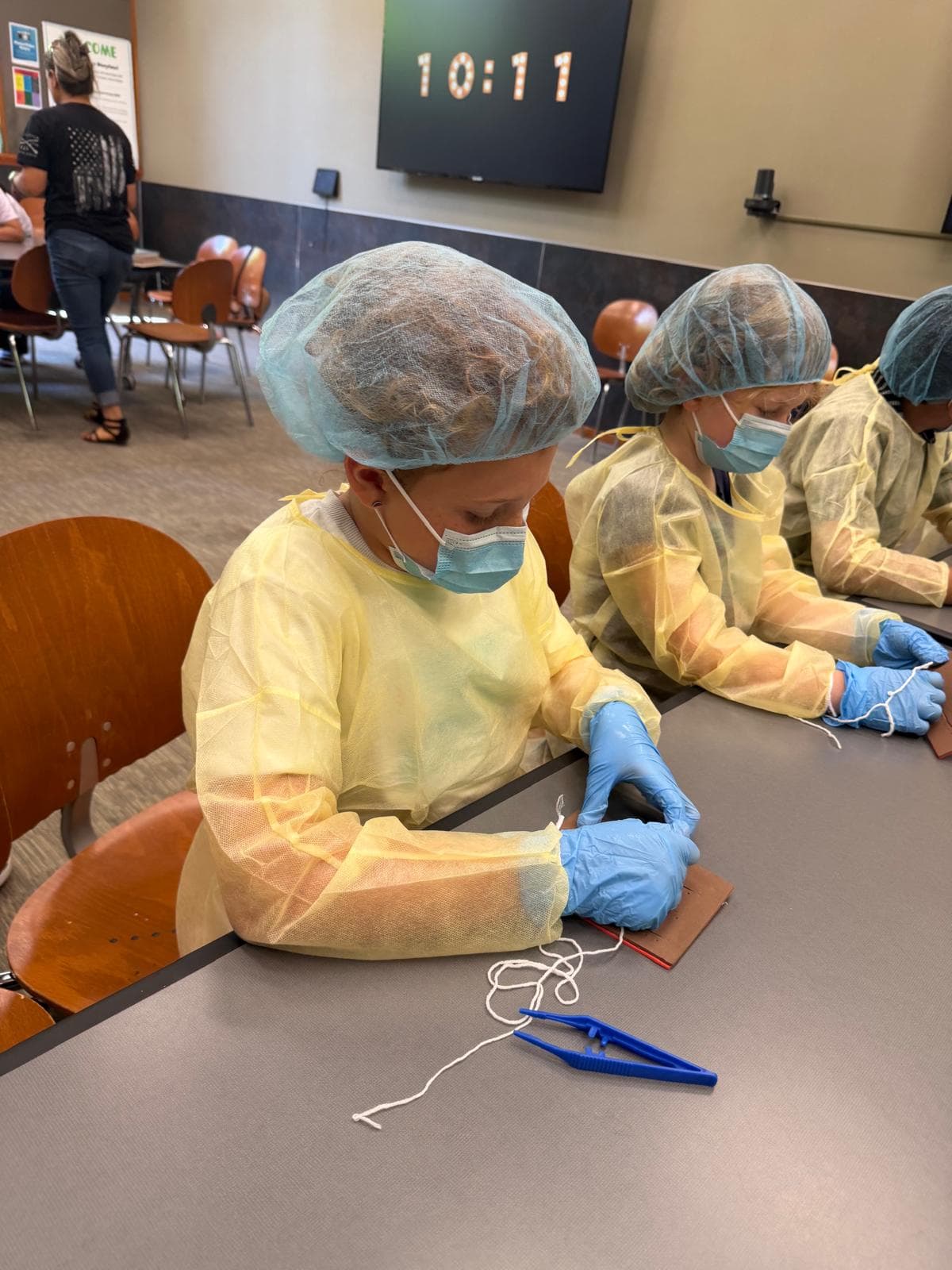 Student practicing suturing